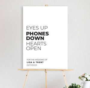 eyes up phones down unplugged wedding sign