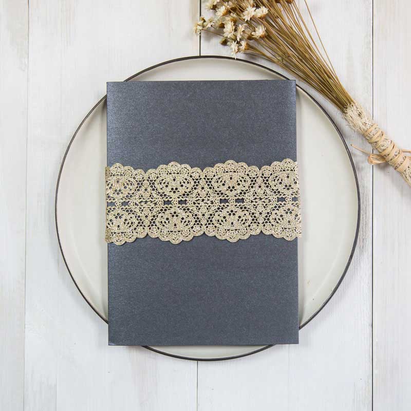 gold laser-cut belly band on black card pocket