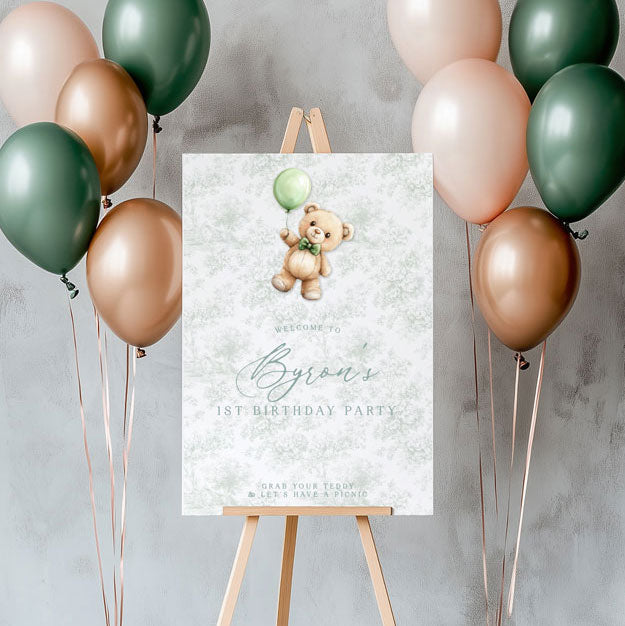 Birthday Welcome Sign with teddy bear holding a sage green balloon with toile background