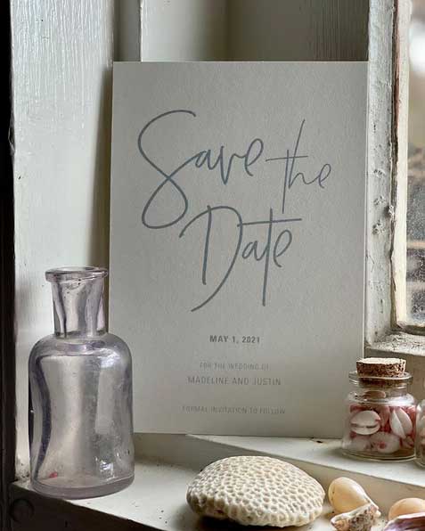 save the date card in a modern font