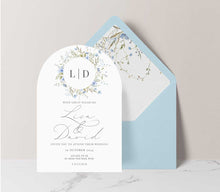 wild blooms arch wedding invitation blue euro envelope