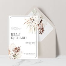Bohemian Elegance wedding invitation in featuring white orchid flowers with dried leaves set with ivory envelope and matching floral liner