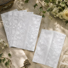 floral vine vellum wrap jacket printed in white ink on transparent paper group