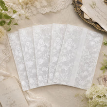 floral vine vellum wrap jacket printed in white ink on transparent paper group