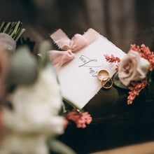 deluxe keepsake vow booklet with pink chiffon ribbon printed on indi handmade deckle edge paper