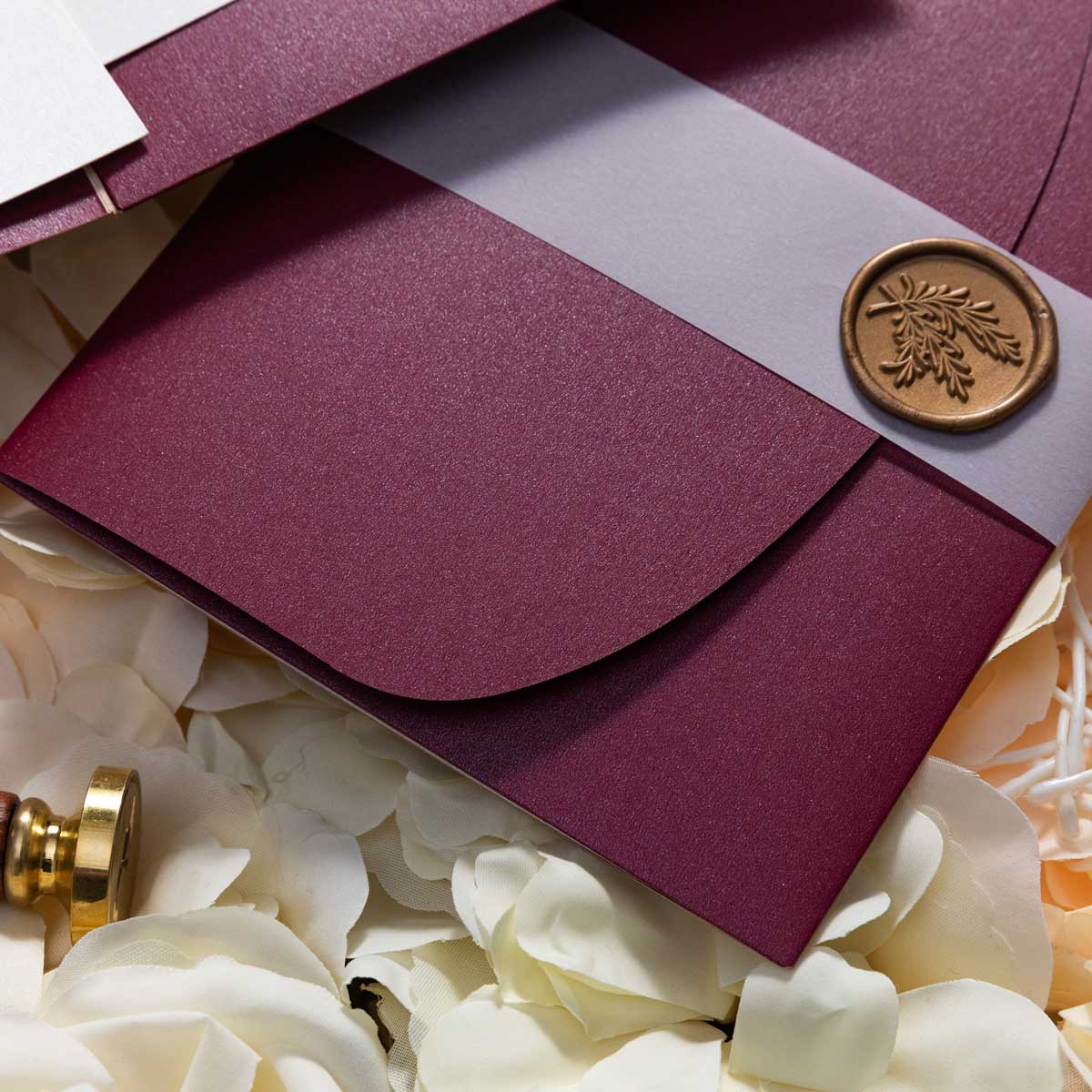 round tri-fold pocket burgundy belly band wax seal