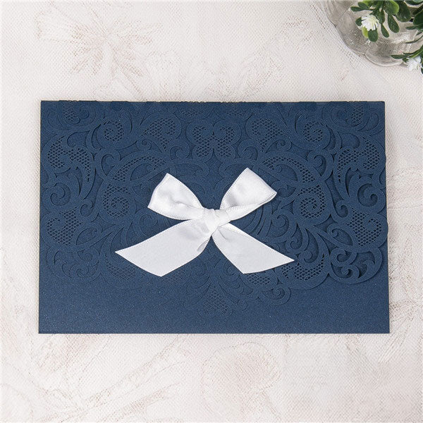 Graceful Heart - Laser-cut Tri-fold Pocket (closed) in navy shimmer, featuring a white bow