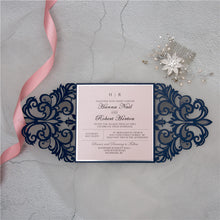 Laser-cut Gate Fold Wedding Invitation with swirl in navy with silver foil backing card
