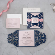 Laser-cut Gate Fold Wedding Invitation with swirl in navy with silver foil backing card, tag, belly band and envelopes