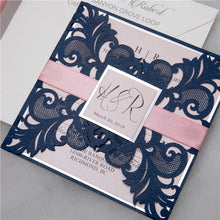Laser-cut Gate Fold Wedding Invitation with swirl in navy with silver foil backing card, belly band and tag