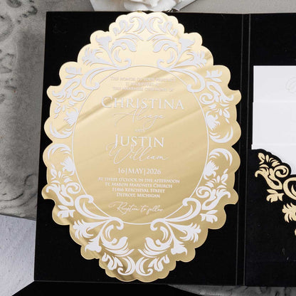 luxurious wedding invitation suite featuring a gold mirror die-cut acrylic invitation, white ink printing with a black velvet pocket with foil