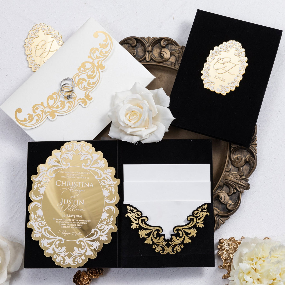 luxurious wedding invitation suite featuring a gold mirror die-cut acrylic invitation, black velvet pocket with foil