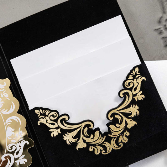 luxurious wedding invitation suite featuring a gold mirror die-cut acrylic invitation, black velvet pocket with foil close up