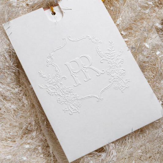embossed pocket in white with personalised monogram vintage emblem on front