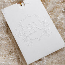 embossed pocket in white with personalised monogram vintage emblem on front