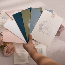 embossed and foil pockets in various colours with personalised monogram vintage emblem on front
