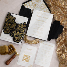 Black gate-Fold Invitation featuring floral design with gold foil invitation suite