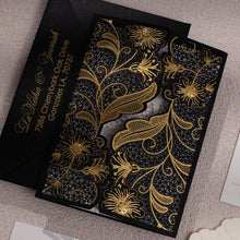 Black Laser-cut gate-fold invitation featuring anemone design with gold foil highlights closed angle