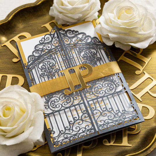 gold acrylic initials on laser-cut invitation