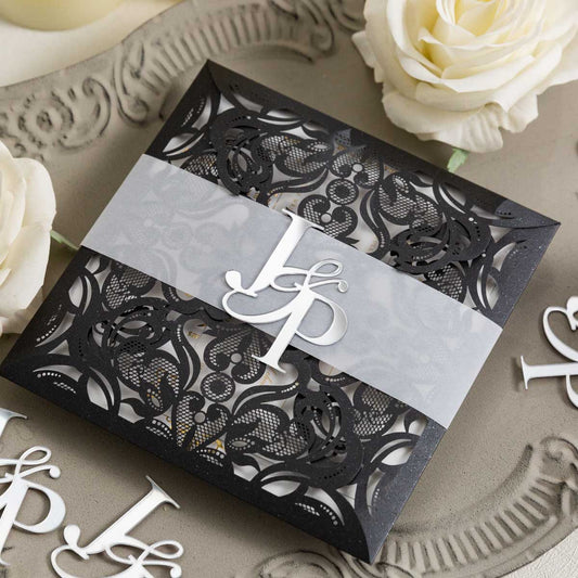 acrylic initials ampersand on laser-cut invitation