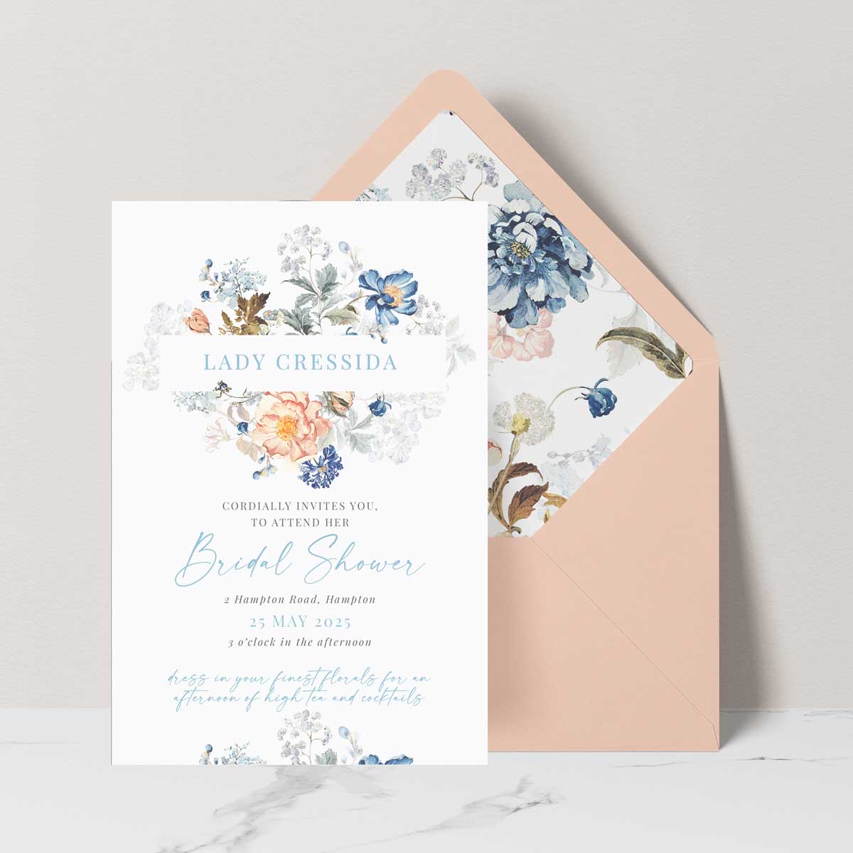 Bridgerton insppired bridal shower invitation with peach and blue florals peach envelope