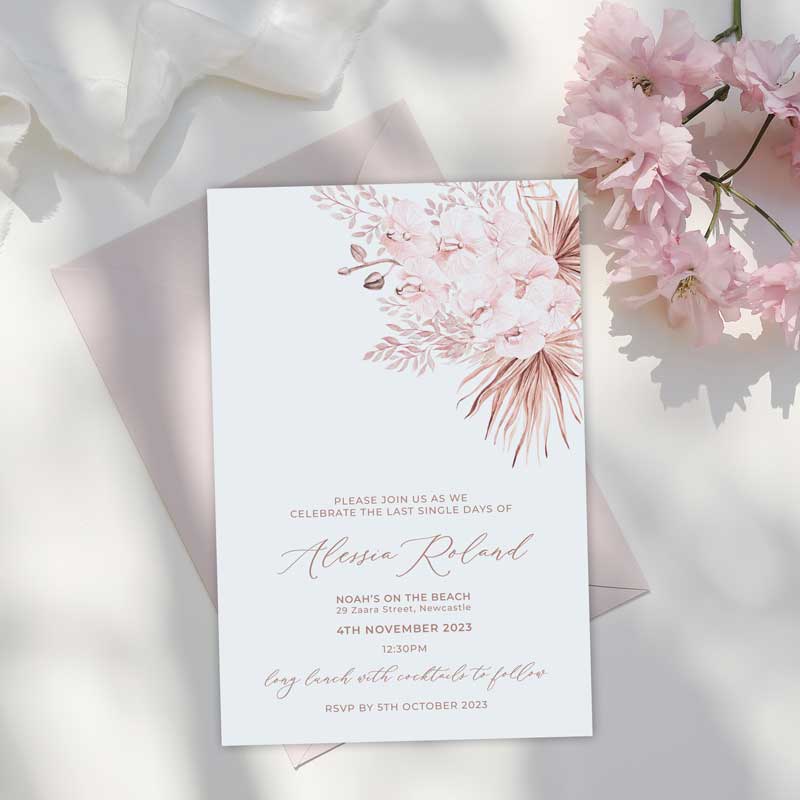 Bridal Shower Invitation featuring soft pink orchid flowers with dried palm leaves 