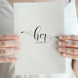bride holding vow booklet