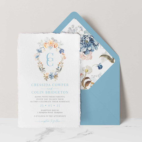 Bridgerton lake vintage inspired floral wreath and monogram wedding invitation suite deckle edge paper with blue envelope and liner