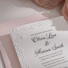embossed wedding invitation with floral design on white card with pink envelope, Newcastle Luxury Wedding Invitations