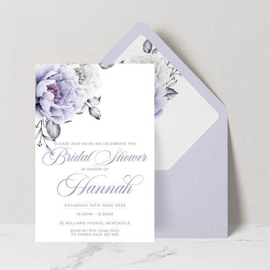 floral rose designed bridal shower invitation featuring white and lavender lilac rose with elegant flowing script font with lavender envelope and liner