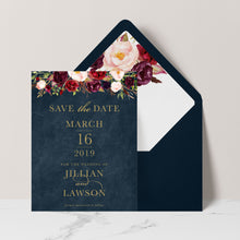 Marsala Flowers Save the Date card with peonie floral design and gold text on a navy background with navy envelope and matching floral liner