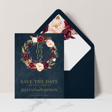 Marsala Flowers Save the Date card with peonie floral wreath design and gold text  on a navy background with navy envelope and matching floral liner