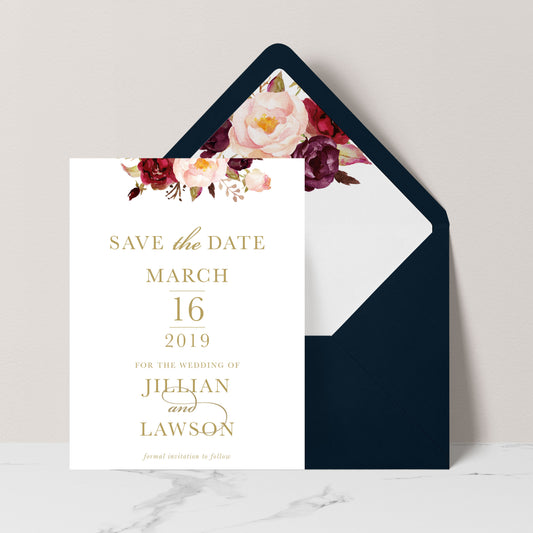 Marsala Flowers Save the Date card with peonie floral design and gold text on a white background with navy envelope and matching floral liner