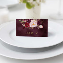 Marsala Flowers Collection, place card with burgundy velvet looking background, the design features lush hand-painted florals in shades of blush, ivory, and burgundy wine, creating a soft yet dramatic contrast. Elegant gold typography adds a touch of luxury, beautifully complementing the warm tones and enhancing the overall sophistication of the piece.