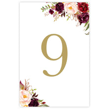 Marsala Flowers Table card featuring gold number, red, burgundy and pink peonie flowers on a white background