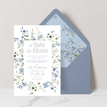 Baby shower invitation with Primrose Spring floral design featuring 'a baby in bloom' dusty blue envelope with floral liner