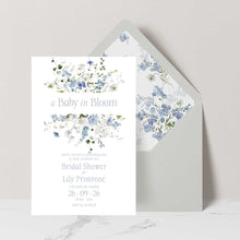 Baby shower invitation with Primrose Spring floral design featuring 'a baby in bloom' dusty blue envelope with floral liner