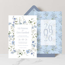 Primrose Spring Wedding Invitation, hand-painted botanicals in powder blue, soft white and fresh green gently frame the invitation, double-sided with date, featuring a dusty blue envelope with matching floral liner