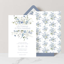 Primrose Spring Wedding Invitation suite, hand-painted botanicals in powder blue, soft white and fresh green gently frame the invitation, featuring a dusty blue envelope with matching floral liner