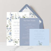 Primrose Spring Wedding Invitation suite, hand-painted botanicals in powder blue, soft white and fresh green gently frame the invitation, featuring a dusty blue envelope with matching floral liner, details and wishing well card