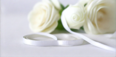 white satin ribbon with white roses