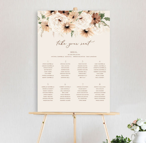bohemian elegance garden of peonie and daisy flowers with leaves in autumn colours at top of table seating chart