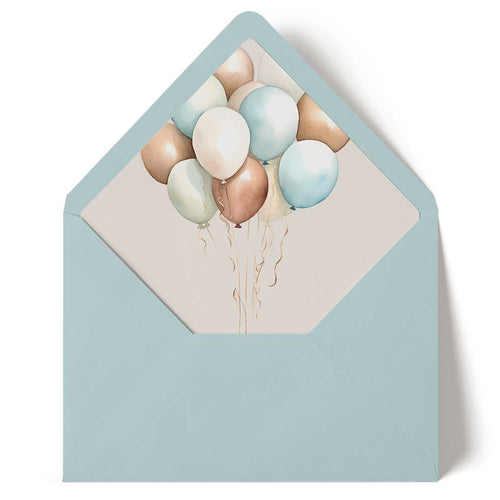 Light blue envelope with a card featuring balloons on a neutral background