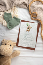 sage green toile design with teddy bear and balloon with a terracotta envelope in a scene with a plush hippo
