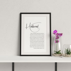 1st year wedding anniversary vow print for husband in a black frame with flowers in vase