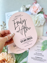 modern wedding invitation printed on blush pink card die-cut to double arch shape