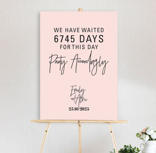 wedding welcome sign featuring days waited and party accordingly