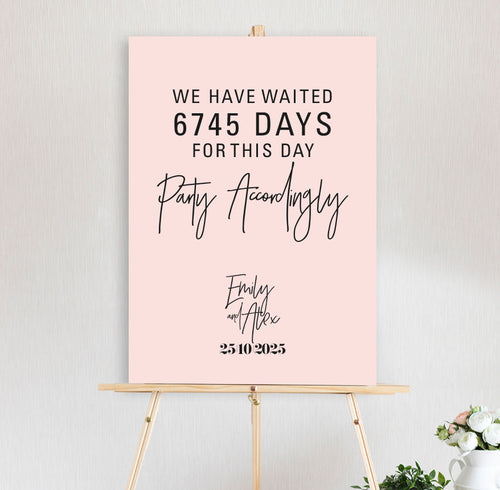 wedding welcome sign featuring days waited and party accordingly