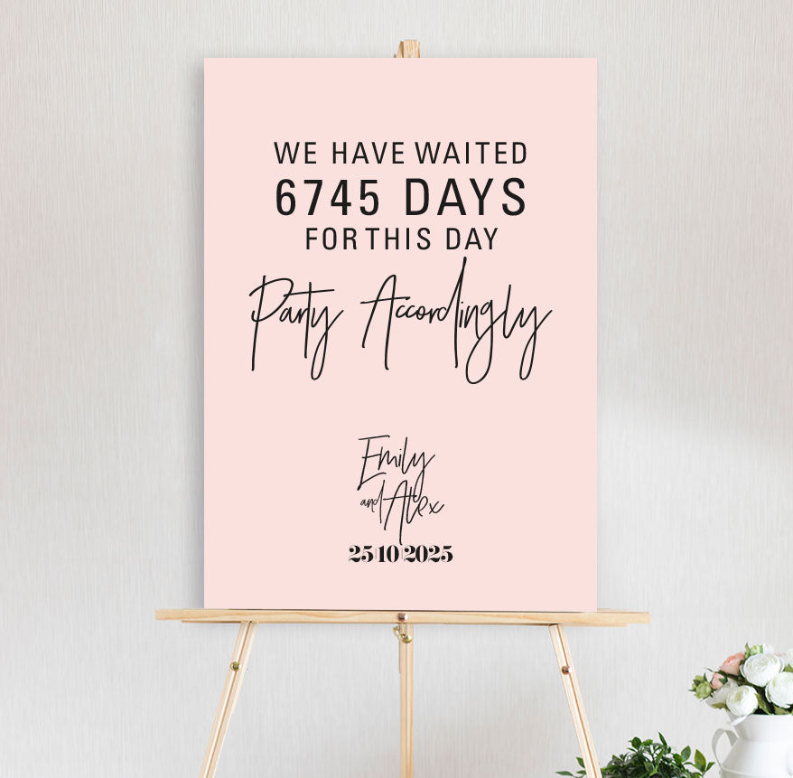 wedding welcome sign featuring days waited and party accordingly