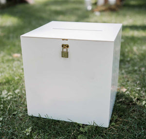 white acrylic wising well box on grass
